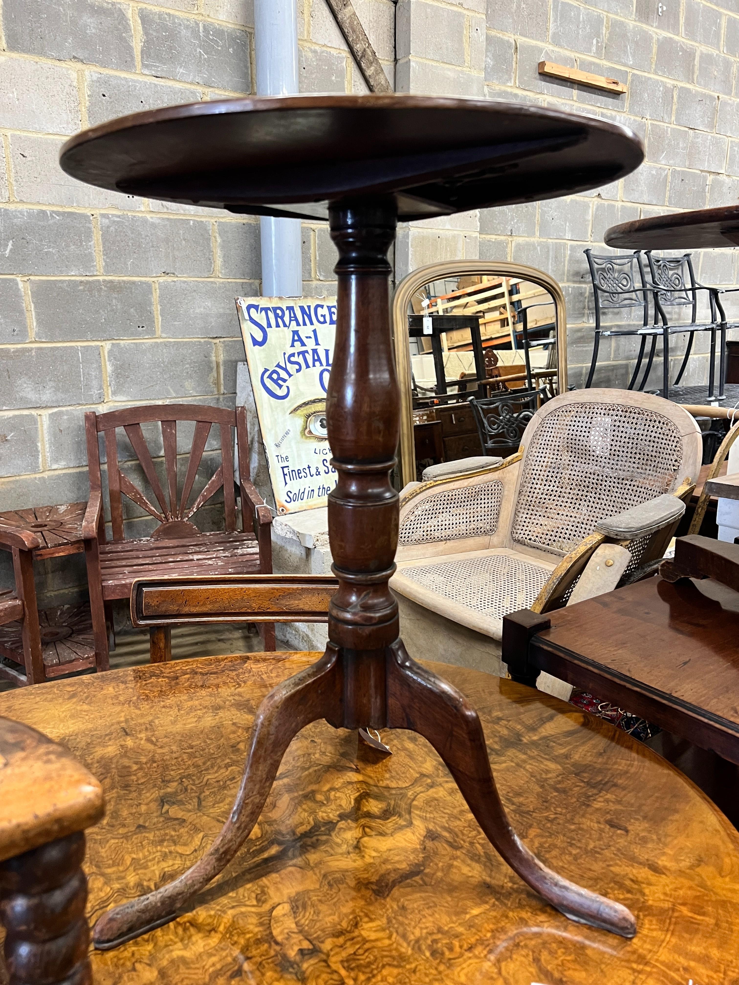 A George III mahogany circular top tripod wine table, diameter 50cm, height 69cm